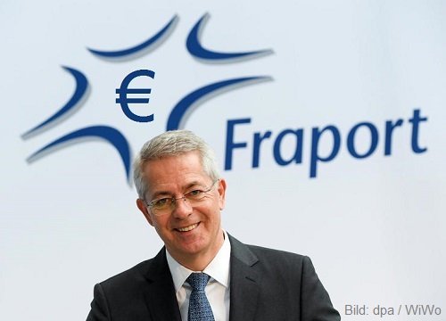 Fraport-Chef Schulte vor erg�nztem Logo